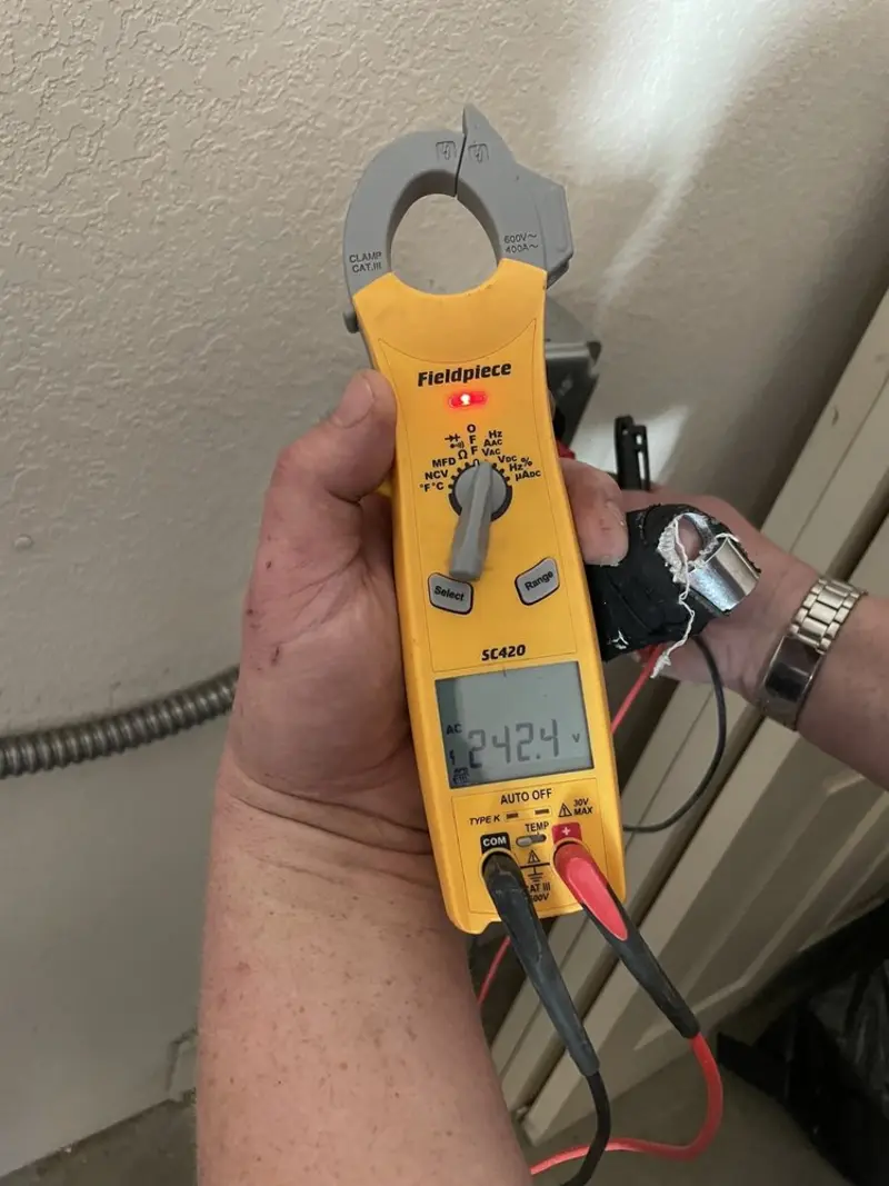 Voltage testing with clamp meter during Ceiling Fan Installation in Hillandale